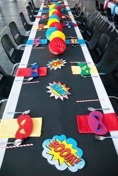 the table is set up with paper decorations