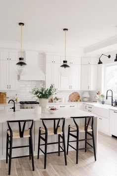 White Cabinet Kitchen With Black Hardware, White Kitchen Cabinet Remodel, White Counter With White Cabinets, Black Handles White Cabinets Kitchen, White Kitchen Ideas Black Hardware, Timeless Black And White Kitchen, Kitchen Ideas With Black Accents, Black Kitchen Fixtures White Cabinets, Kitchen With Matte Black Hardware