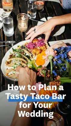 people are serving food at a table with flowers on it and the words how to plan a tasty taco bar for your wedding