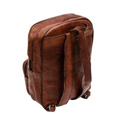 This elegant 16 Inch vintage brown backpack from Classy leather Bags serves as an exemplary option among all other backpacks in the market. Ideal for carrying your Notebook or a small laptop. It can also be used for Tablets, MacBooks, and iPads. It has a multipurpose central compartment for accommodating laptops and diaries as well as money in a segregated manner. The small pockets can hold coins, keys, or other small necessities. The flap has a smart closure with buckles. It's a perfect blend o Vintage Satchel Backpack For On-the-go, Vintage Leather Travel Backpack, Classic Brown Leather Backpack For Daily Use, Vintage Brown Backpack For On-the-go, Classic Rectangular Laptop Bag For Trip, Brown Satchel Laptop Bag For Trip, Brown Laptop Bag With Luggage Sleeve For Trip, Classic Brown Leather Backpack For Everyday, Vintage Backpack For On-the-go