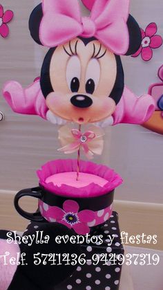 a minnie mouse centerpiece sitting on top of a table