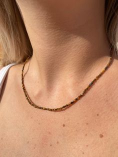 Stunning Tigers Eye dainty faceted bead choker measuring 42cm 16inches with 5cm 2inch extender chain in gold tone with small heart charm.  Manifest your dreams, focus on the good Dainty Adjustable Faceted Crystal Necklace, Dainty Faceted Crystal Necklace With Adjustable Chain, Dainty Faceted Crystal Necklace With Adjustable Fit, Minimalist Faceted Bead Choker Necklace, Adjustable Gold Charm Necklaces With Gemstone Beads, Adjustable Dainty Crystal Necklace With Faceted Beads, Dainty Faceted Bead Choker Necklace, Minimalist Adjustable Faceted Crystal Necklace, Trendy Faceted Beads Necklaces As Gift