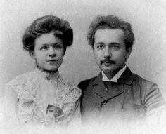 an old black and white photo of two people