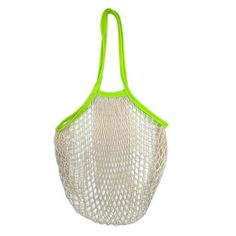 a white net bag with green handles