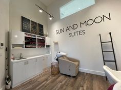 a salon with sun and moon suites on the wall