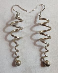 Here's an AWESOME pair of shiny sterling silver swirl & twisted shaped earrings! These are marked .925 as seen in the last picture. These would be super pretty for Valentine's Day! These are extremely nice and would go with many different chains! The condition of these are PERFECT , and are  BRAND NEW without their factory original packaging! I will be listing several vintage clip & pierced earrings in the following week; approximately 10+ pairs a day! Thanks for viewing my items! Please check photos for extra details and information! I will be listing lots of jewelry & items in the next few days & weeks! Jewelry items include: Vintage & New jewelry pieces, Clip Earrings, Pierced & Post Earrings, Bracelets, Necklaces, Pendants, Charms, Rings, Jewelry Sets, ect To look up my Jewelry items, Lots Of Jewelry, Vintage Clip, New Jewelry, Rings Jewelry, Clip Earrings, Pierced Earrings, Earings Piercings, Post Earrings, Silver 925