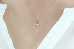 Treat her to a special gift with this luxurious 10K rose gold open heart pendant necklace from Heartland by Beverley Mitchell. Adorned with 1/10 carat of truly exquisite diamonds of H-I color and I1- I2 clarity, 30 natural diamonds in total. This exquisite pendant features a delicate rose gold tapered bail and comes on an 18" rope chain with a spring ring clasp. The perfect accessory to show your special someone your love, this stunningly beautiful necklace will make any occasion truly unforgett Rose Gold Diamond Heart Necklace With Charm, Rose Gold Heart Pendant Diamond Necklace, Rose Gold Diamond Heart Pendant Necklace, Elegant Rose Gold Heart Necklace With Diamond Cut, Elegant Rose Gold Diamond Cut Heart Necklace, Rose Gold Open Heart Necklace With Diamond Accents, Rose Gold Heart-shaped Diamond Necklace, Rose Gold Heart Cut Diamond Necklace For Wedding, Dainty Rose Gold Diamond Heart Necklace