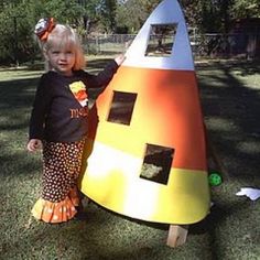 Candy Corn Bean Bag Toss {Halloween Party Games for Kids}A bean bag toss is a great game for a family party because all ages can play.  Making it more challenging is as easy as having the players take a step back.  This candy corn version is perfect for your Fall party.View This Tutorial Bean Bag Toss Game Diy, Harvest Festival Games, Halloween Bags Diy, Halloween Party Games For Kids, Party Games For Kids