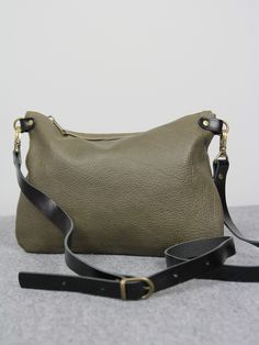 "Limited edition crossbody bag- holiday sale. A small handbag should be in the possession of every woman. More and more often we only go out with a phone and a few small things, so this handbag will be perfect. This crossbody bag is handcrafted from olive green grain leather. A great bag for everything you need. Fastened with a zipper. The bag is lined with cotton fabric. It's designed it to be classy and minimal to match with any outfit. * Made from genuine Italian leather. * Adjustable crossbo Leather Hip Bag, Soft Leather Bag, Women Crossbody Bag, Leather Crossbody Purse, Small Crossbody Bag, Small Handbags, Leather Pouch, Medium Bags, Green Leather