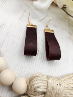 Beautiful, fun genuine leather earrings. Perfect for everyday wear or special occasions. You will love these trendy, genuine leather earrings. Each pair is handmade by us with lead free, stainless steel hooks. They hang at approximately 2.5 inches for the perfect everyday look. All earrings may vary slightly due to leather patterns. Colors may vary slightly due to screen variations. Leather Patterns, Leather Pattern, Bar Earrings, Leather Earrings, Everyday Look, Special Occasion, Everyday Wear, Genuine Leather, Screen