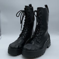 Givana Lace Up Combat Boots With Inside Zipper New In Original Box Original Box May Not Be In Perfect Condition Black High-top Lace-up Boots With Zipper, Black Mid-calf Boots With Zipper Closure And Round Toe, Black Combat Boots With Zipper For Streetwear, Faux Leather Combat Boots With Zipper Closure, Black Edgy Combat Boots With Zipper Closure, Edgy Black Combat Boots With Zipper Closure, Edgy Black Combat Boots With Zipper, Black High Ankle Martin Boots With Zipper, Black Ankle Martin Boots With Zipper