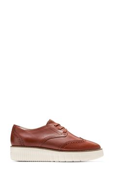 A chunky platform sole adds a stylish boost to a brogued wingtip derby fashioned from rich leather. Leather upper/synthetic lining/rubber sole Imported Derby Fashion, Chunky Platform, Cole Haan, Nordstrom Rack, Derby, Rubber Sole, Leather Upper, Oxford, Nordstrom