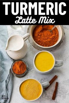 turmeric latte mix in white mugs with cinnamon sticks and spices on the side