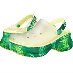 Crocs Bae Classic Platform Clog Size 6 In Tropical Translucent And Pale Yellow. The Only Bae You Need In Your Life Is This Charming Crocs Classic Bae Clog, Made Of Croslite With Textured Details Around The Heel, Toe Box, And Collar. The Platform Is A Style Relevant Version Of The Classic Featuring A Heightened, Contoured Outsole That Supports The Upper You Know And Love With A Slimmer, Sleeker Look. Iconic Crocs Comfort: Lightweight. Flexible. 360-Degree Comfort. Upper, Lining, Insole, And Outso Green Beach Clogs With Cushioned Footbed, Green Clogs For Beach In Spring, Yellow Platform Clogs For Summer, Green Clogs For Spring Beach Occasions, Green Clogs With Cushioned Footbed For Summer, Yellow Clogs With Rubber Sole For Spring, Green Cushioned Clogs For Summer, Green Synthetic Clogs For Beach, Yellow Rubber Sole Clogs For Spring