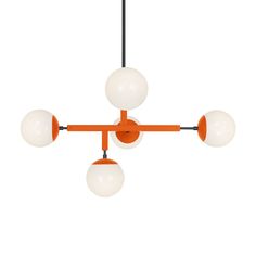 an orange and white chandelier hanging from a black cord with three balls on it