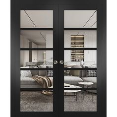 a living room filled with lots of furniture next to a glass door that leads into a kitchen