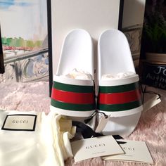 Gucci Web Lai Rubber Slide Sandal For Men, Available In Size 9 And 10. Brand New In A Box, Comes With Two Dustbag And Care Card. A Casual Rubber Slide Sandal With Our Web Detail. White Rubber With Green And Red Web Molded Rubber Footbed Rubber Sole Flat Made In Italy Msrp $695 Luxury White Leather Slides, White Flat Gucci Slides, Designer White Leather Slides, Classic White Slides With Round Toe, Luxury White Slip-on Slides, Designer White Round Toe Sandals, Classic White Slip-on Sandals, Designer White Slip-on Sandals, Luxury White Flat Sandals