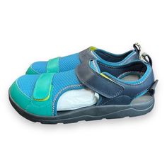 Introducing The Brand New Teva Kids Hurricane Seekado Water Sandal Shoe In Gray/Green! This Shoe Is Perfect For Casual Wear And Comes In A Uk Size 3, Us Size 4, And Eu Size 36. The Shoe Shaft Style Is Low Top With A Hook & Loop Closure For Easy Wear And Removal. This Unisex Shoe Features A Microfiber Upper Material With A Textile Lining Material, And A Flat Heel Height Of Under 1 Inch. The Outsole Material Is Made Of Eva + Rubber, Making It Waterproof And Perfect For Water Activities. The Shoe A Breathable Blue Sandals For Vacation, Playful Outdoor Sandals For Summer, Breathable Green Sandals For The Beach, Breathable Green Sandals For Beach, Playful Outdoor Sandals For Spring, Green Open Toe Playful Sandals, Playful Green Open Toe Sandals, Breathable Blue Sandals For Beach, Playful Synthetic Sandals For Outdoor