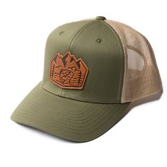 Fish. Camp. Repeat. This hat isn’t about style, it’s about function. But if it happens to look good on you, that’s just a bonus. The leather patch on the front? It’s not just there for show. It’s a rugged badge of honor—an emblem of what truly matters: fishing, camping, and getting things done. You see mountains, trees, and a fish. That's all you need to know. It's nature, and nature doesn’t need explanation. It’s just a damn good hat for someone who enjoys the simple life outdoors. Why You'll Love It: Permanently Attached: Our full grain leather patches are designed to stay on, come rain or shine, ensuring they'll never come off with regular wear. Crafted for Everyday: The leather patch adds a rugged, yet refined touch that pairs well with any outfit. Versatile Design: A nod to the classi Diy Leather Dog Collar, Moleskine Cover, Diy Dog Collar, Collars Diy, Leather Mouse, Leather Mouse Pad, Oxblood Leather, Dog Collars & Leashes, Fish Camp