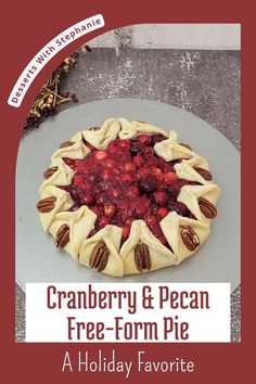 view of an unbaked cranberry pie with pecans