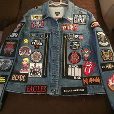 a denim jacket with patches on it