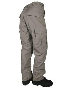 The TRU-SPEC 8-Pocket BDU Pants are built with many of the same features as the classic MIL-SPEC BDU but with added YKK brass zipper and a DropN accessory/phone pocket, these pants are even better today. Specs & Features: YKK brass zipper fly Two adjustable side tabs with bartack reinforcements Belt loops have a 2.25" wide opening and are secured with two bartacks Two front slash pockets Two rear inserted pockets with snag proof and fused pocket flaps Two bellowed three pleated cargo pockets wit Combat Style Khaki Work Pants With Pockets, Military Style Work Pants For Outdoor Activities, Outdoor Full-length Work Pants With Pockets, Functional Work Pants With Side Pockets, Combat Style Work Pants With Pockets For Outdoor Activities, Combat Style Work Pants For Outdoor Activities, Tactical Khaki Pants With Pockets, Solid Color Techwear Cargo Pants With Side Pockets, Tactical Outdoor Bottoms With Side Pockets