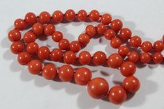 -Antique 14k Gold Natural Red Orange Coral Beaded Necklace -Total length: 24.5 in -Coral size: 5 mm ~ 11 mm -Clasp size: 12.3 mm x 10.3 mm x 7.65 mm (thickness) -Total weight: 35.6 g -Not perfectly round -The biggest bead have a small hole on it -Some have hairline cracks -Have a mark but cant see -Tested 14k gold Formal Single Strand Red Coral Necklace, Formal Single Strand Red Coral Jewelry, Elegant Red Coral Round Necklace, Elegant Red Coral Necklace For Formal Occasions, Elegant Red Coral Necklace For Formal Events, Elegant Red Coral Jewelry With 8mm Beads, Classic Red Coral Formal Jewelry, Formal Gemstone Beaded Necklaces, Classic Red Jewelry With Round Beads