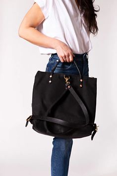 Black Wax Canvas Backpack | Convertible & Durable Bag – MeanwhileBackOnTheFarm – Meanwhile Back on the Farm Wax Canvas, Waxed Canvas Backpack, English Bridle, Waxed Canvas Bag, Stylish Backpacks, Dark Denim Jeans, Convertible Bags, Canvas Backpack, Waxed Canvas