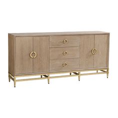 a sideboard with three drawers and two brass handles