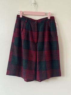 Hello there vintage lovers! This listing is for a pair of vintage high waisted plaid shorts. Dark tartan gives it a pink feel. Please see measurements for the sizing. Bermuda style and super high waisted. They have pockets! size x-small or Small based on measurements. Material is wool.  Measurements: 13" waist 21" long 12" rise  9" inseam.  Condition: Excellent Vintage Condition. No holes or damage that I can tell. This is a vintage piece. You will most likely not find another. Thank you for you Vintage Lovers, Vintage Lover, Plaid Shorts, Vintage 70s, Dark Red, Short Outfits, Tartan, Favorite Outfit, High Waist