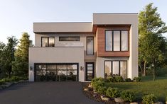 a modern house with lots of windows and landscaping