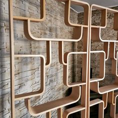 the shelves are made out of wood and have different shapes