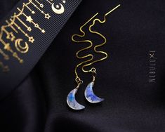 ✨ Shine Bright like a Rainbow Moonstone with this Stunning Crescent Moon Threader Earrings - The Ultimate June Birthstone jewellery gift for your loved one! The iridescent sheen of the Rainbow Moonstone is truly mesmerizing, and the crescent moon design adds a touch of celestial magic to any outfit ✨ ⭒ Ball Studs:  4mm ball/15mm post * 925 Sterling Silver ⭒ Ball Stud pushbacks: butterfly backing encased in silicone ⭒ Hoops:  10mm/14mm * Stainless Steel ⭒ Hooks:  2"/5cm long * 925 Sterling Silver Wire Wrapped Moon Shaped Earrings, Moon Shaped Wire Wrapped Earrings Gift, Crescent Wire Wrapped Earrings For Gift, Crescent Wire Wrapped Earrings As Gift, Gold Threader Earrings, February Birthstone Necklace, Rainbow Moonstone Jewelry, Howlite Necklace, Moon Gold