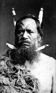 an old photo of a man with horns on his head