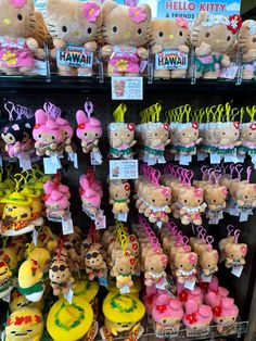 many stuffed animals are on display for sale