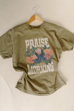 Making His praises bloom, with our "Sing His Praise Each Morning" tee. This vibrant design features our hand-drawn florals and our whimsical birdie. 100% Ring-spun Cotton. Garment-dyed for that vintage, faded look and almost no shrinkage at home Relaxed fit Order+ Shipping Policy: https://chaudoincreationsky.com/pages/shipping-policy Refund /Exchange Policy: https://chaudoincreationsky.com/pages/refund-policy Trending Tshirt Design Ideas, Godly Shirts, Graphic Tee Ideas, Cute T Shirt Designs, Indie Wardrobe, Christian Asthetic, Cute Christian Shirts, Christian Boutique, Etsy Shirts