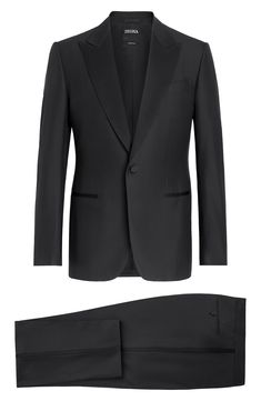 A sumptuous choice for formal wear, this classically styled black tuxedo is impeccably tailored in Italy from a blend of superfine wool and lustrous silk. Jacket has one-button closure; peaked lapels; split cuffs; chest pocket; welt pockets; side vents Trousers have zip fly with hook-and-bar closure; front slant pockets; back button-welt pockets Jacket is lined; trousers are lined to the knee 85% wool, 15% silk Dry clean Made in Italy Men's Designer Clothing Classic Formal Tuxedo With Structured Boning, Black Tuxedo Suits With Structured Boning, Black Tuxedo With Structured Boning, Classic Evening Tuxedo With Structured Boning, Classic Three-piece Suit For Black-tie Events With Pressed Crease, Classic Three-piece Suit With Pressed Crease For Evening, Black Evening Suits With Structured Boning, Luxury Black Tie Suit With Pressed Crease, Timeless Black Three-piece Suit For Formal Occasions