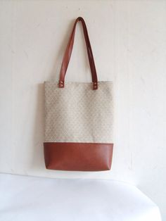 Leather tote linen tote geometric print tote bag by allbyFEDI Square Brown Canvas Bag For Daily Use, Brown Square Canvas Bag For Daily Use, Brown Tote Bag With Canvas Lining, Ethically Sourced Everyday Tote Bag, Brown Rectangular Canvas Bag With Canvas Lining, Brown Square Canvas Bag For Everyday Use, Brown Canvas Tote Bag With Canvas Lining, Rectangular Brown Canvas Bag With Leather Handles, Brown Canvas Tote Bag For Shopping