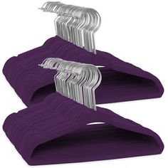 three purple hangers are stacked on top of each other with silver clips attached to them