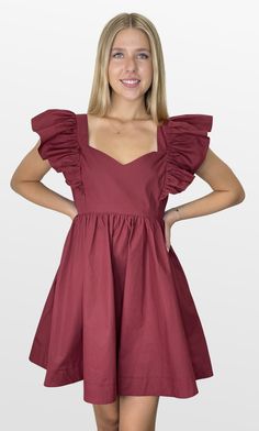 Definitely the plan. This color-match babydoll dress mixes trend and comfort. The fitted lined bodice has an open back that double ties for the perfect fit. The shoulder ruffle sleeves are just the right touch with a full skirt that gives plenty of movement and comfort. Look your best on Gameday! Color- Burgundy (Also Available in Crimson, Navy, and Purple) 100% Cotton Lining- 100% Polyester Summer A-line Puff Sleeve Dress With Ruffles, Solid Color A-line Mini Dress With Ruffles, Solid Color Cotton Puff Sleeve Dress With Ruffles, Puff Sleeve Ruffle Dress For Brunch, Chic Cotton Puff Sleeve Dress With Ruffles, Spring Puff Sleeve A-line Dress With Ruffles, Spring Red Puff Sleeve Dress With Ruffles, Feminine A-line Puff Sleeve Dress With Ruffles, Summer Puff Sleeve Dress With Flutter Sleeves And Ruffles