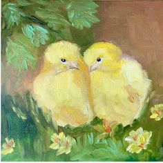 two yellow chicks are sitting in the grass