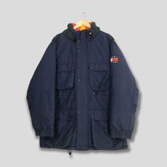 "Vintage Tommy Hilfiger Puffer Parka Jacket XLarge Tommy Hilfiger Sailing Gear Bomber Jacket Tommy Winter Wear Skiing Cold Weather Jacket XL Please contact me for any questions about this clothing before buying. Size on tag : Size XL Measurement : Armpit to armpit : 25\" inches Back collar to hem (total length) : 33\" inches Weight : 1.54 kg Condition : Good Condition. No holes and stains.  Delivery / Postage :- DHL EXPRESS / EXPEDITED = 3-5 business day. ** WE ARE USING DHL EXPRESS, IT TAKES 3- Winter Outerwear With Pockets For Outdoor Activities, Casual Windproof Outerwear For Winter Sports, Outdoor Winter Wear Hooded Jacket With Pockets, Casual Parka For Winter Sports, Casual Winter Parka For Winter Sports, Casual Winter Sports Parka, Winter Sports Parka With Pockets, Long Sleeve Parka With Fleece Lining For Outdoor, Long Sleeve Parka With Fleece Lining For Outdoor Activities