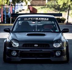 the front end of a black subarun car