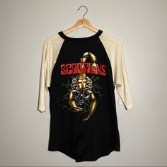 Scorpions Tour Vintage Band T Shirt With Long White Sleeves Band Merch Tops For Fall Fan Merchandise, Band Logo Tops For Fall Fan Merchandise, Band Logo Tops For Spring Streetwear, Fall Band Logo Crew Neck Tops, Band Logo Crew Neck Top For Fall, Crew Neck Tops With Band Logo For Fall, Band Logo Merch Tops For Fall, Band Merch Tops With Band Logo For Fall, Scorpions Band