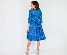 "~ 1950s royal blue & turquoise blue dress ~ Beautiful quality polished cotton ~Front bow at bust line ~ Gathered full skirt ~ Matching 30\" fabric covered belt ~ Back 19\" metal zipper ~ Excellent Bust- 36\" (91.44 cm) Waist- 26\" (66.04 cm) Hips free Length-40\" (101.6 cm) Shoulders- 14.5 (36.83 cm) Sleeve- 17\" (43.18 cm) Belt- waist fits 23-27.5\" (58.42-69.85 cm) More Incredible Vintage: glennasvintageshop.etsy.com Vintage Jewelry: glennasjewels.etsy.com Instagram @glennas_clothing Face Fitted Blue Dresses With Box Pleat, Blue Formal Dress In 1950s Style, Blue Fitted Dress With Box Pleat, Fitted Blue Dress With Box Pleat, Blue Retro Dresses With Fitted Bodice, Blue Retro Dress With Fitted Bodice, Formal 1950s Style Blue Dress, Formal Blue 1950s Style Dress, 1950s Style Blue Formal Dress