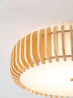 a light that has some wooden strips on it