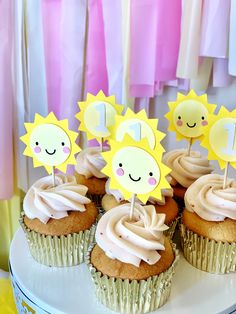 cupcakes decorated with sun and moon decorations