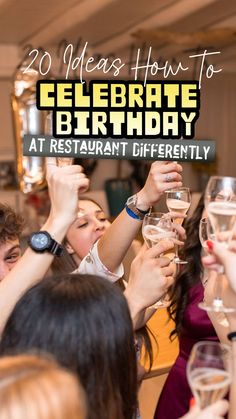 people raising their glasses in the air with text overlay that reads, 20 ideas how to celebrate birthday at restaurant differently