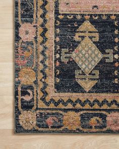 an area rug with various colors and patterns