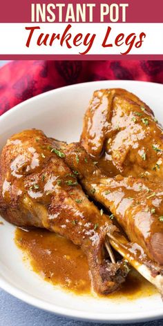 instant pot turkey legs with gravy on a white plate and text overlay that reads instant pot turkey legs